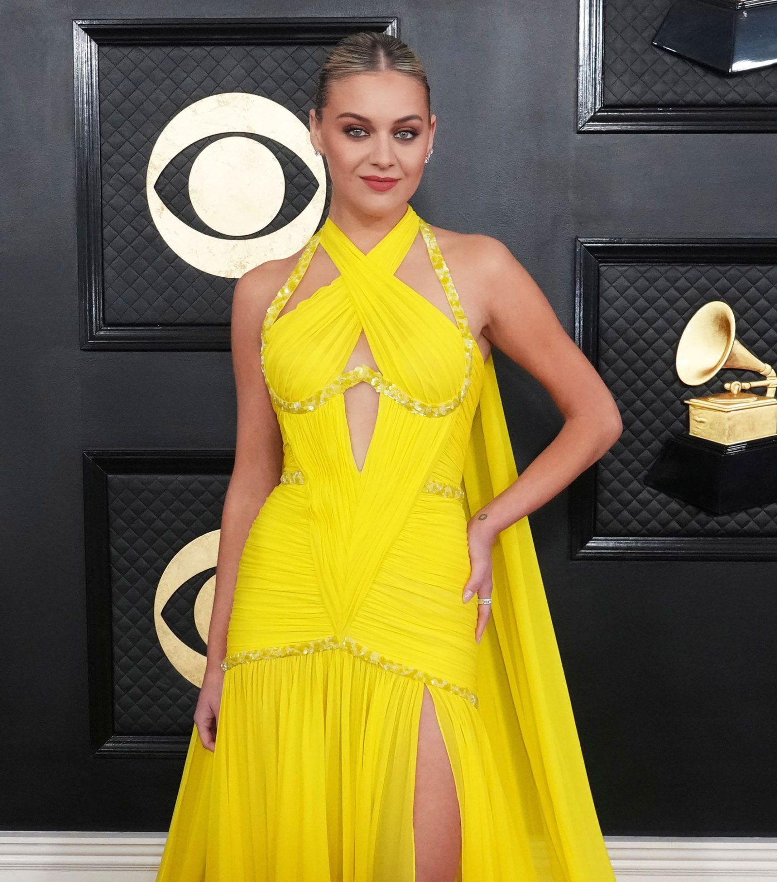 Grammys 2023: Kelsea Ballerini Makes Appearance on the Red Carpet hand on hip