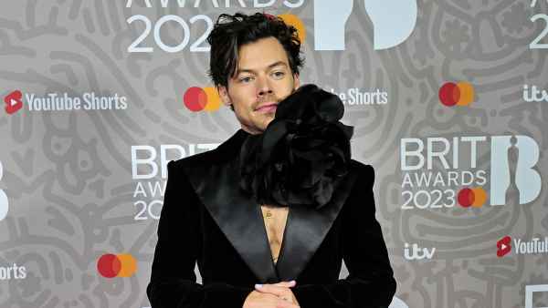 Harry Styles Wears Giant Flower Choker on 2023 Brit Awards Red Carpet: See Photos