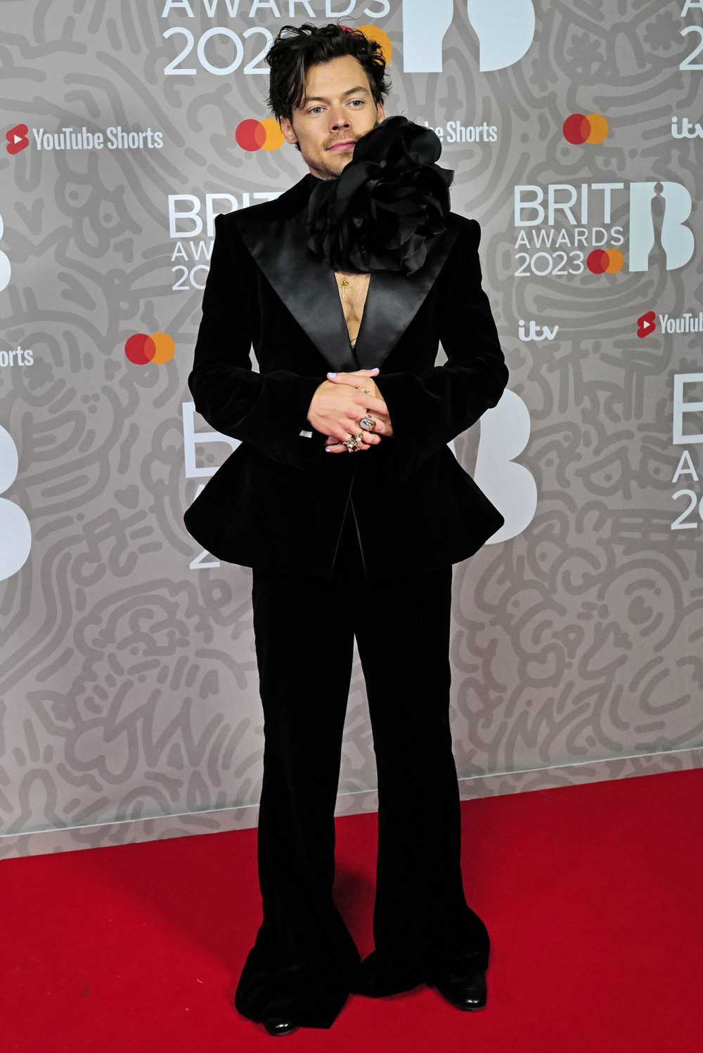 Harry Styles Wears Giant Flower Choker on 2023 Brit Awards Red Carpet: See Photos