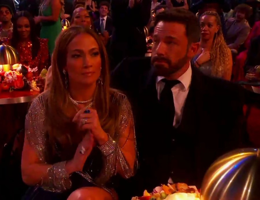 Jennifer Lopez Attends the 2023 Grammys In a Blue Gucci Gown With Ben Affleck by Her Side clapping