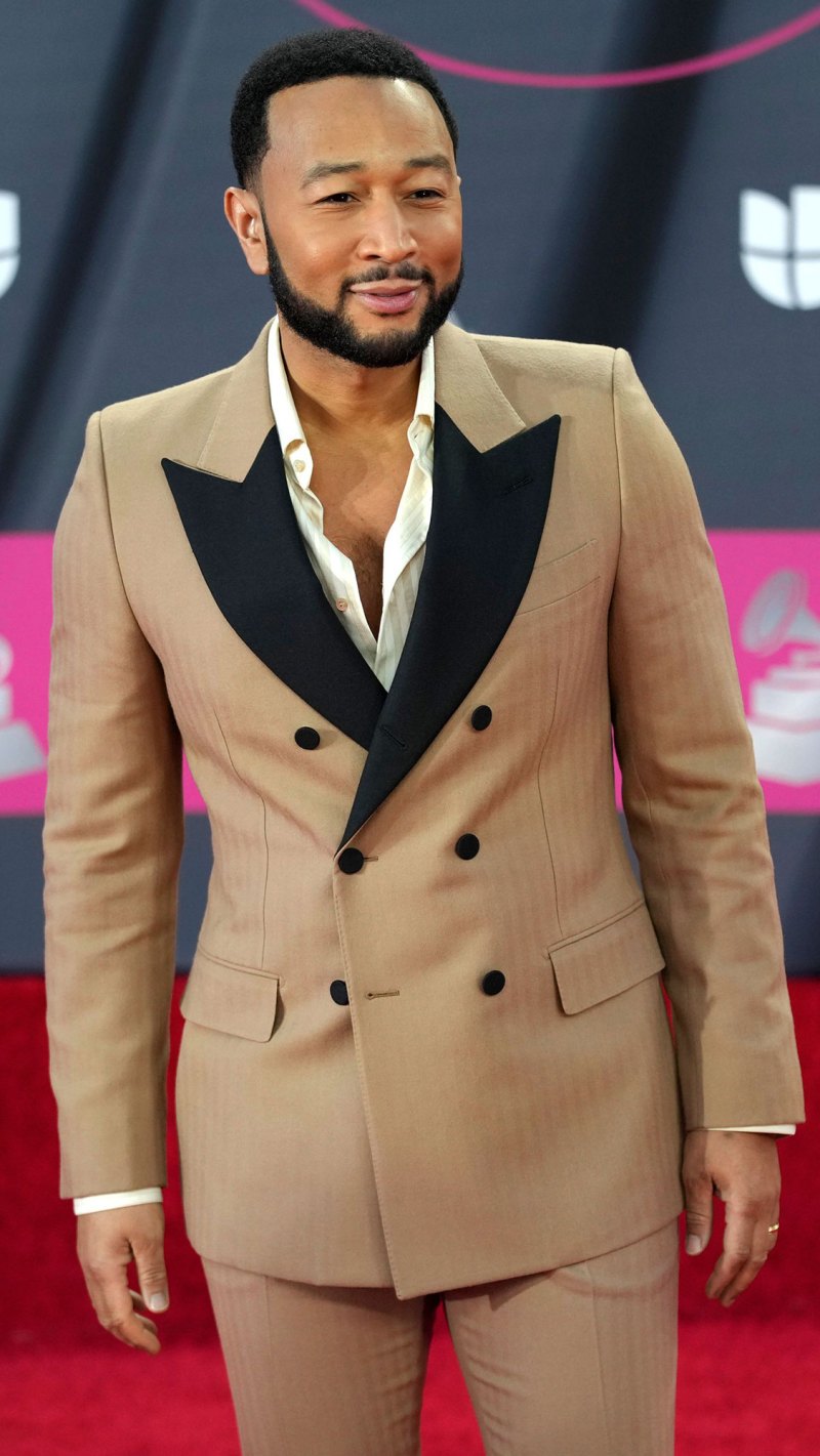 John Legend Works at CVS for the Day to Promote His New Skincare Line tan suit