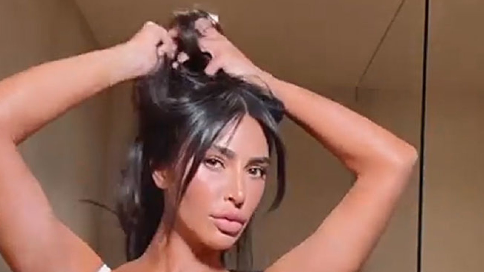 Kim Kardashian Gets Curtain Bangs Feature