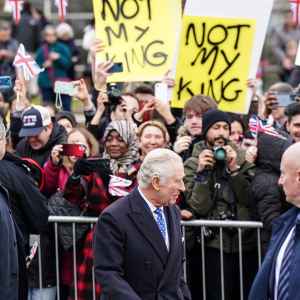 King Charles III Ignores Protestors With 'Not My King' Signs Outside Royal Engagement in London