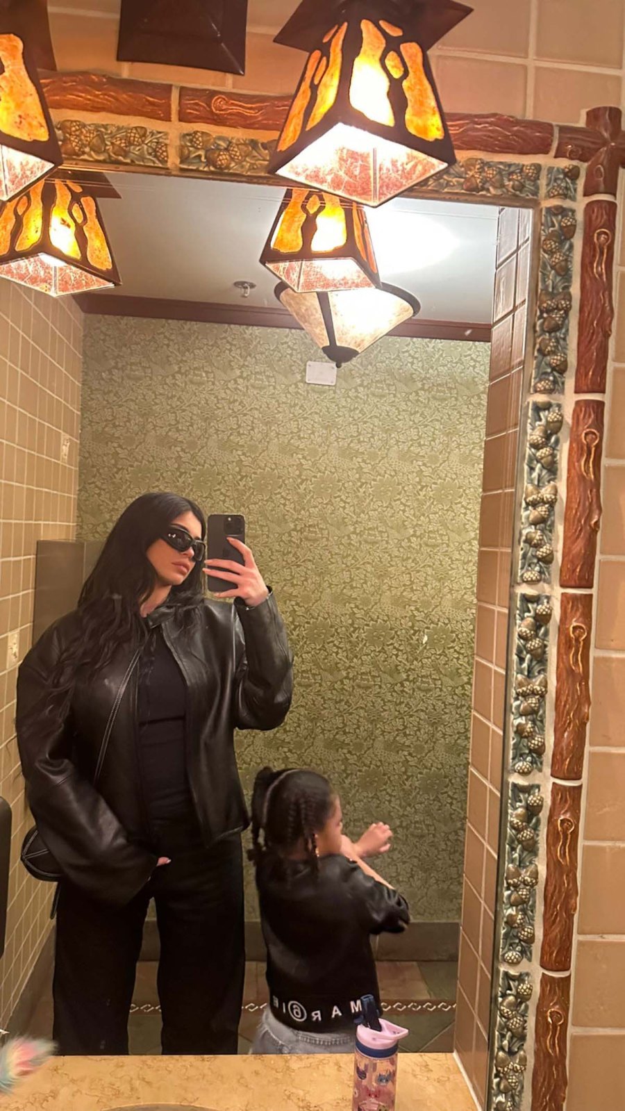 Kylie Jenner Treats Aire to 1st Taste of Ice Cream During Disneyland Trip