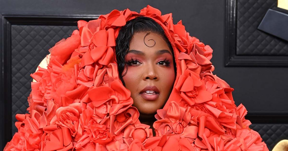 Grammys 2023 Lizzo Rocks a Red Rose Caped Gown on the Red Carpet