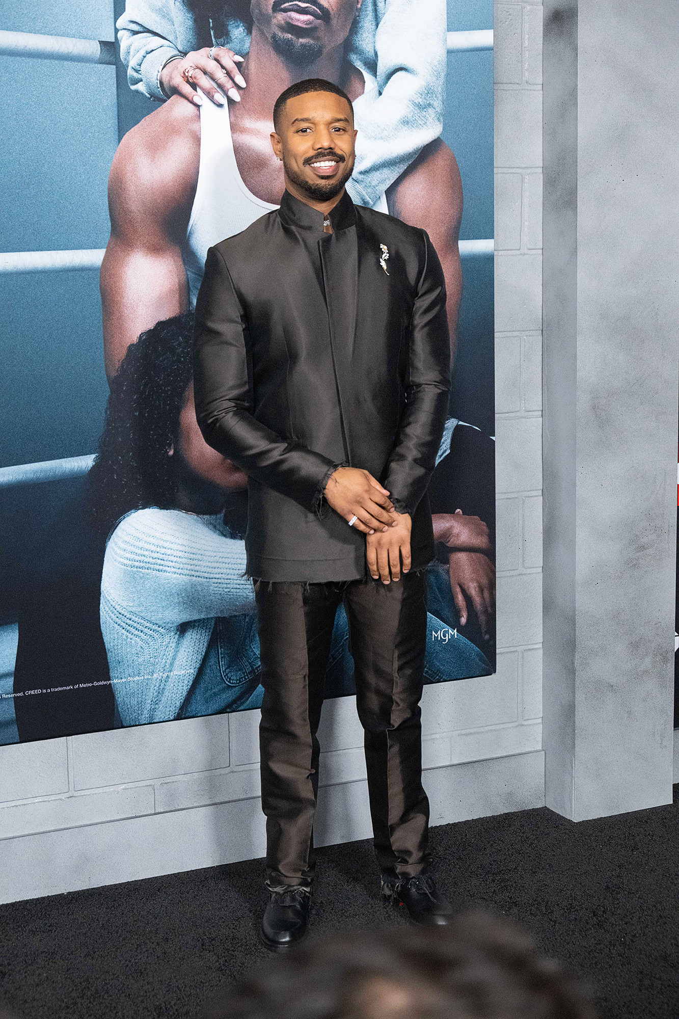 Michael B. Jordan's Dapper Style Evolution: Vibrant Suits, Sheer Tanks and  More