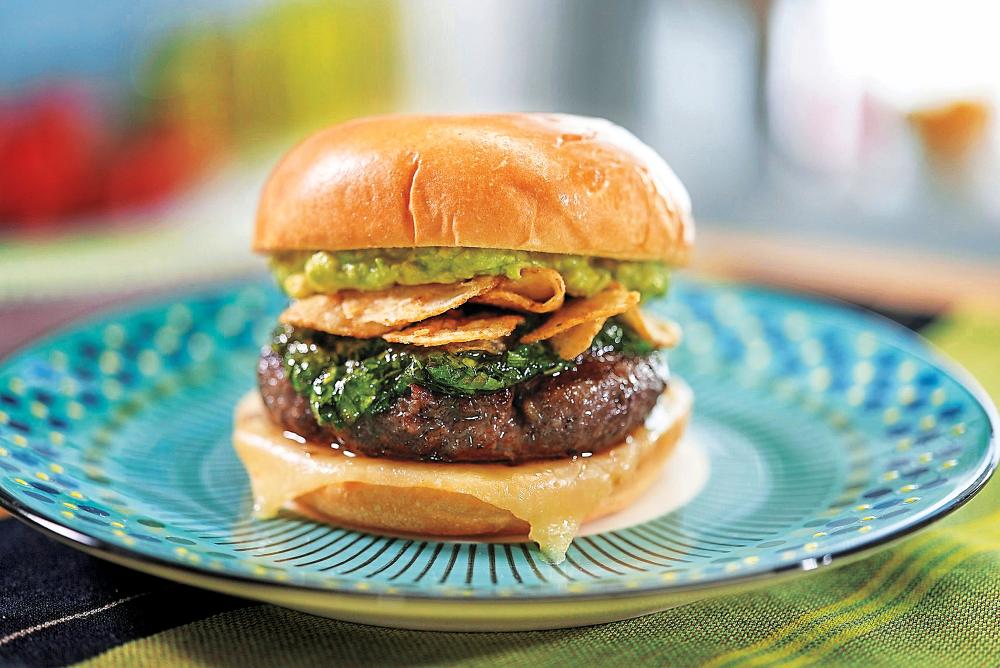 NFL Tailgate Takedown&rsquo;s Sunny Anderson Shares How to Make Her Spice Green Goddess Burger for Super Bowl Sunday