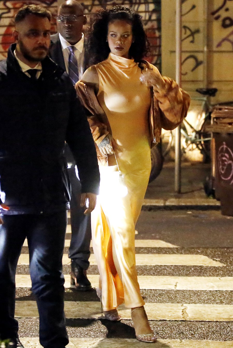 Rihanna Shows Off Baby Bump at Milan Fashion Week With ASAP Rocky: Photos