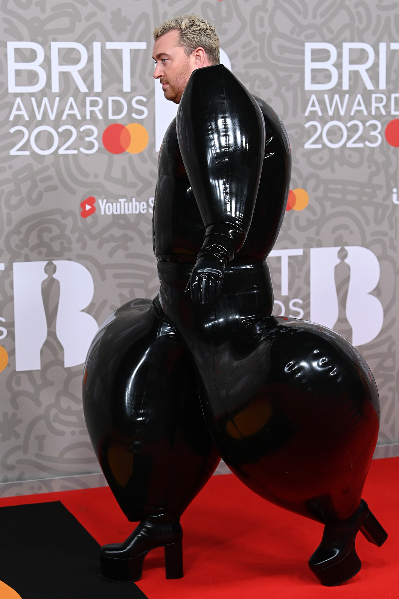 Brit Awards 2023 Sam Smith Wears Latex Jumpsuit on Red Carpet