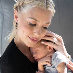 Tarek El Moussa and Heather Rae Young Reveal How Christina Haack Reacted to Their Son's Birth: 'She's Very Happy for Us' holding baby