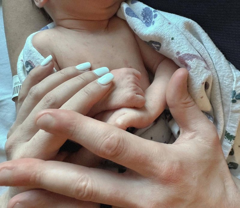 Tarek El Moussa and Heather Rae Young's Son Tristan's Baby Album: Photos hands