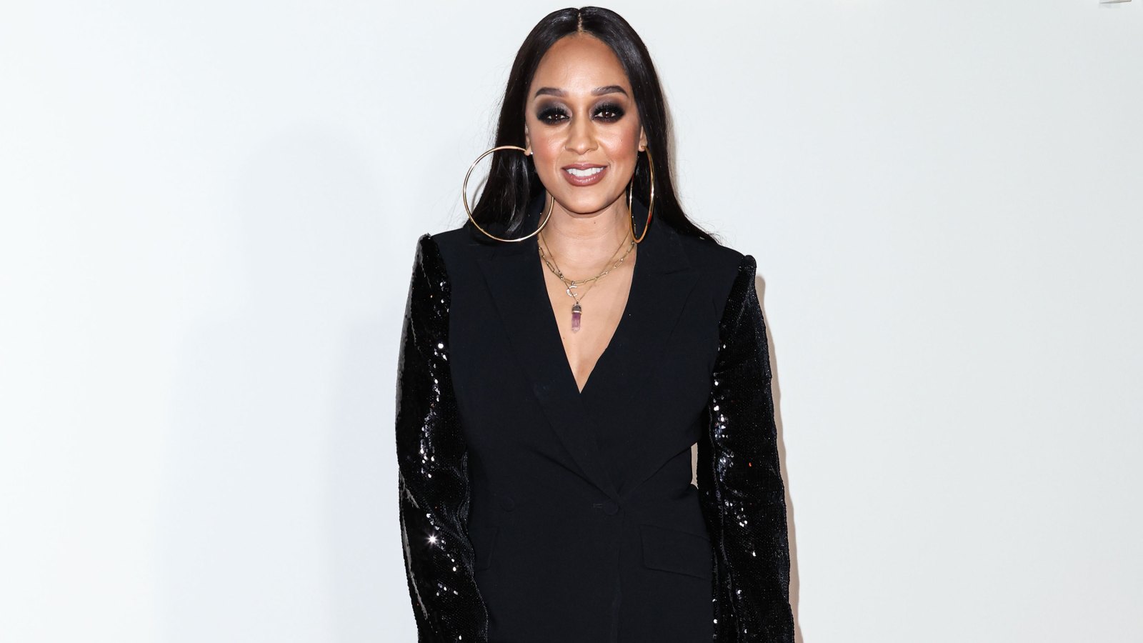 Tia Mowry Rocked a Leopard Print Bodysuit and Thigh-High Boots — But Her Son Cree Disapproved