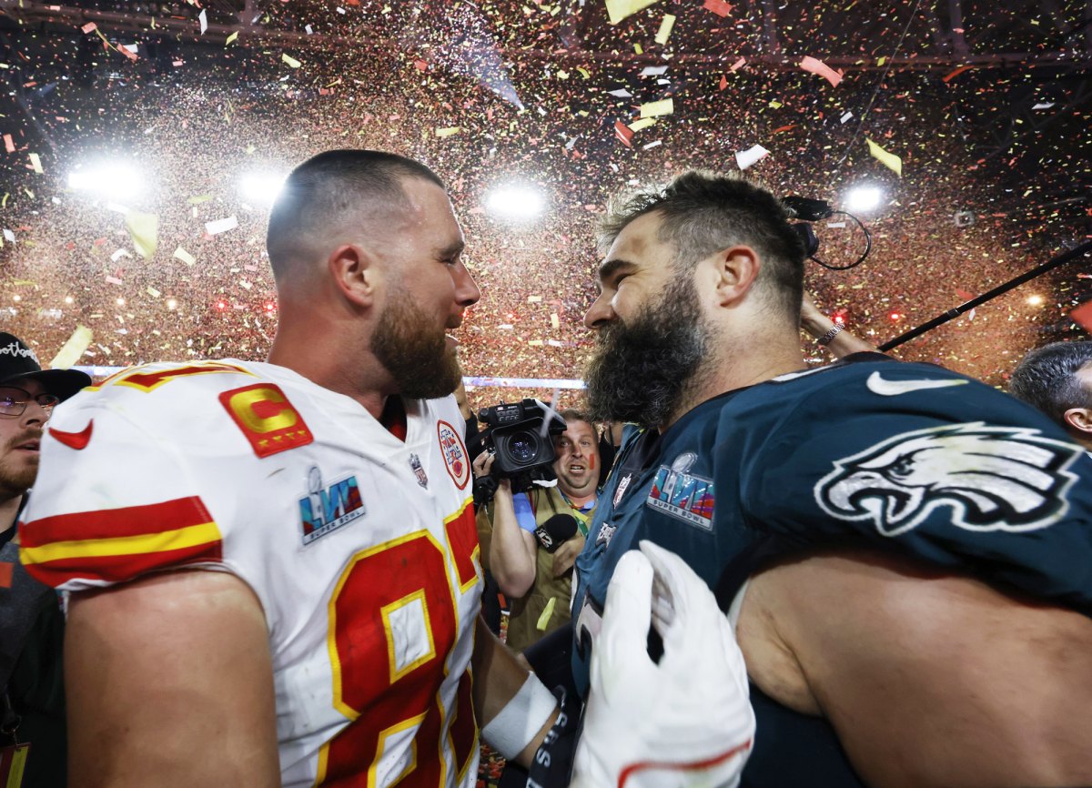 Travis and Jason Kelce Share Hug on the Super Bowl Field