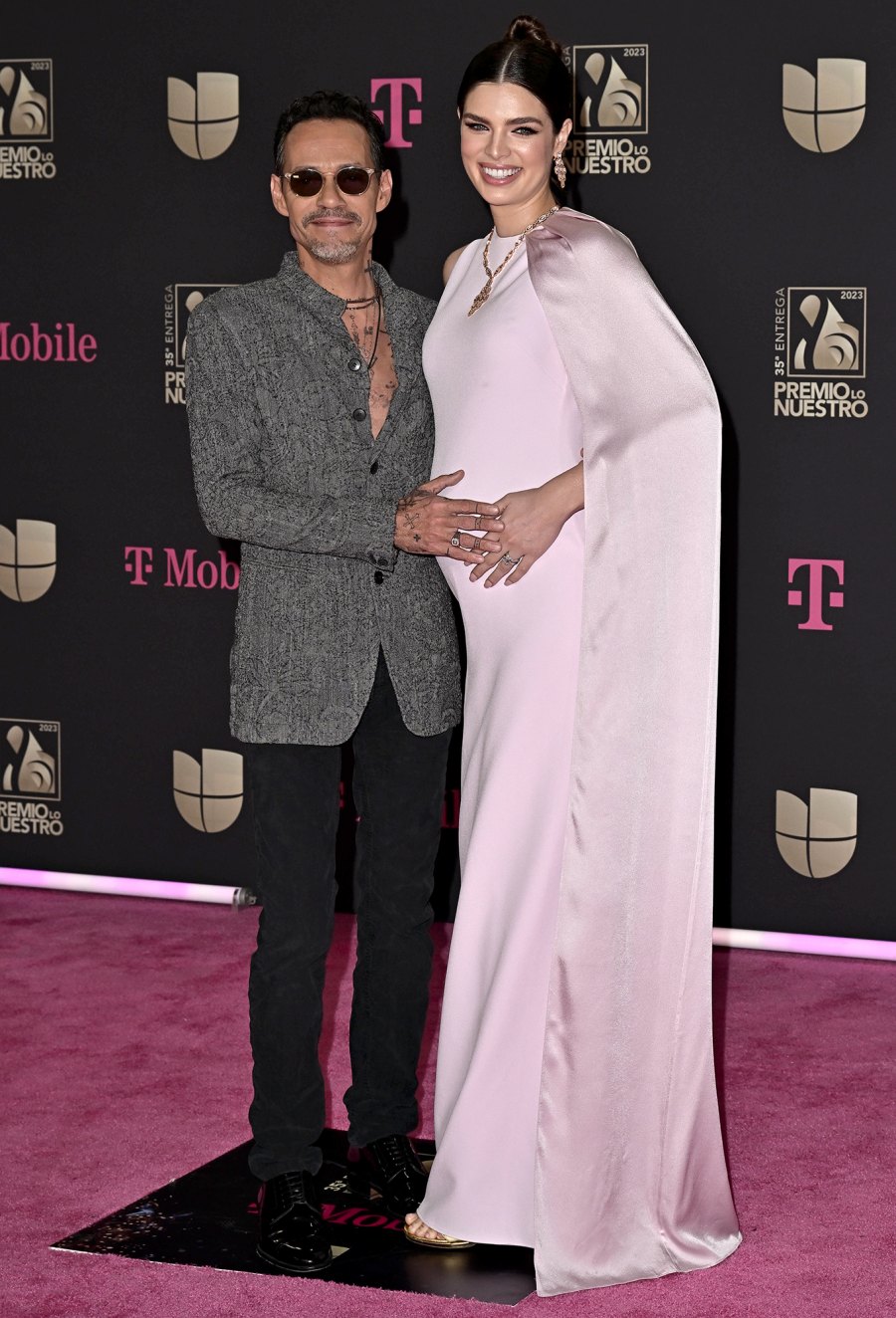 Daddy Duty! Marc Anthony Cradles Wife Nadia’s Baby Bump on Red Carpet