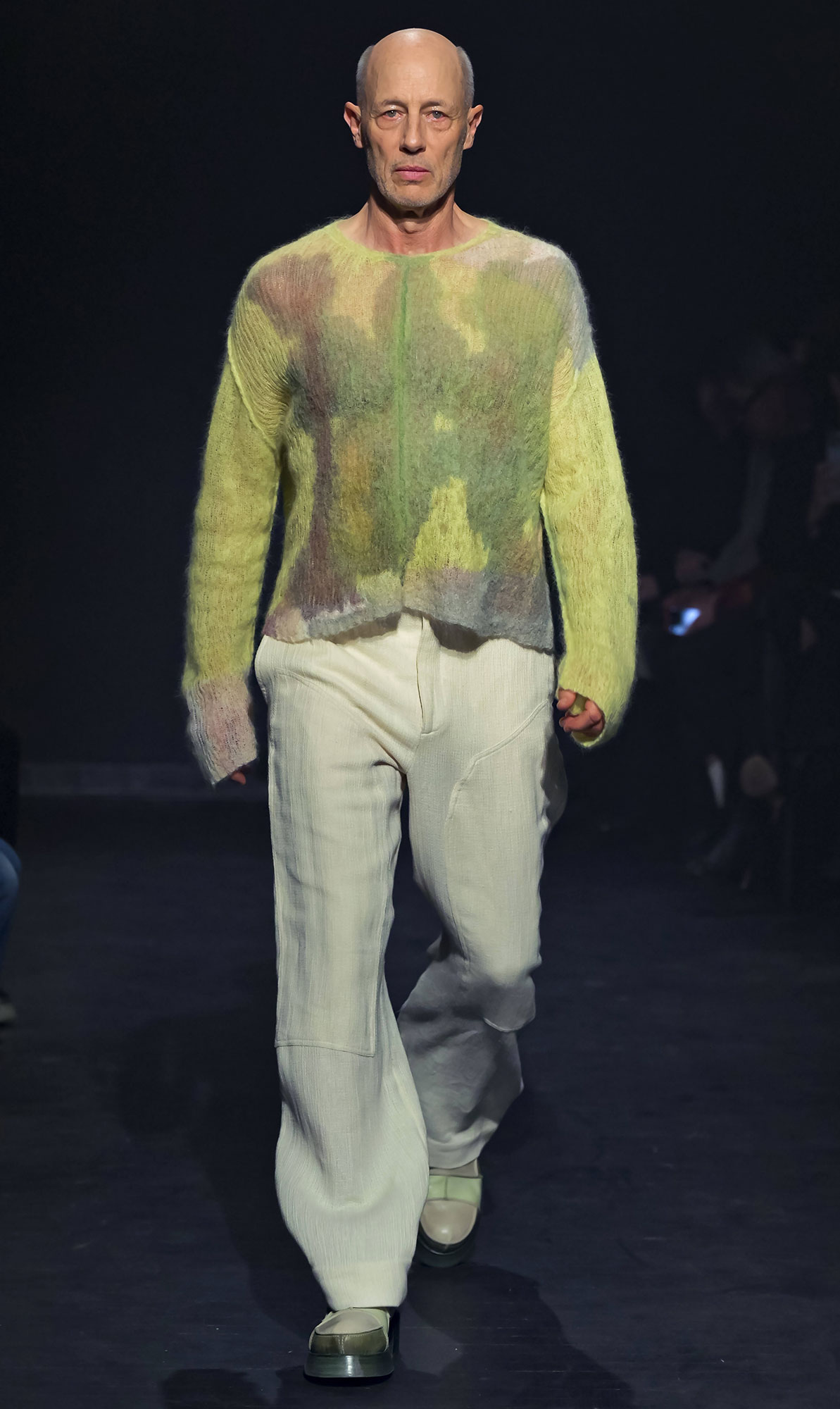 ‘The White Lotus’ Star Jon Gries Makes Surprise Runway Appearance at New York Fashion Week green sweater