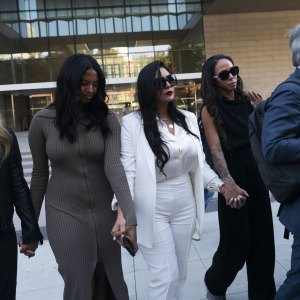 Kobe Bryant's Family Accepts Nearly $29 Million From Lawsuit as Vanessa Bryant Finishes Settling Case white suit