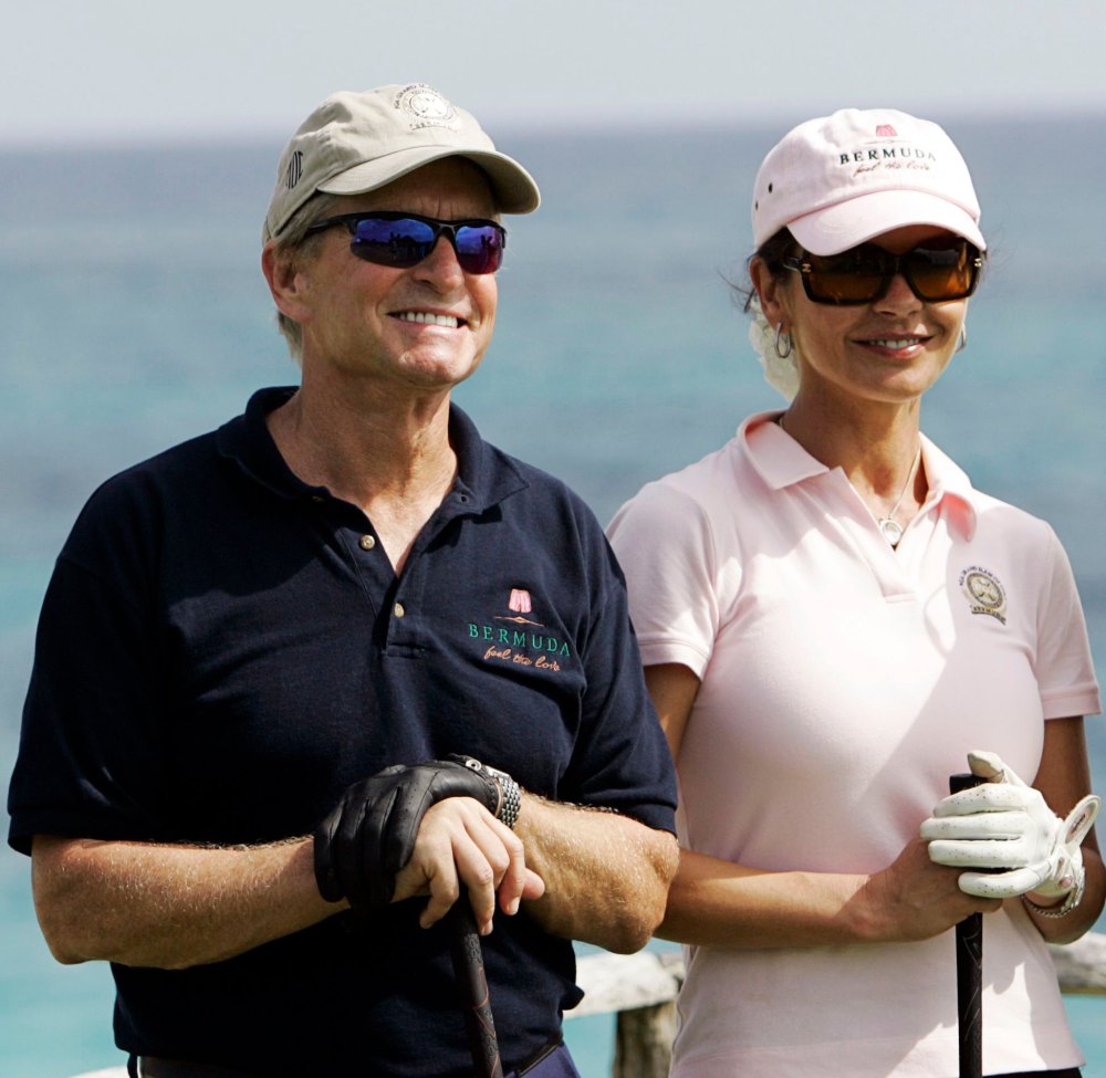 Michael Douglas Says Catherine Zeta-Jones Makes Him Flash Her If He Plays Poorly at Golf