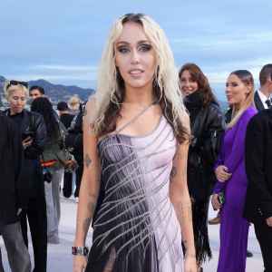 Miley Cyrus Brings the 'Grime and Glamour' on 8th Album ‘Endless Summer Vacation’: Lyric Breakdown purple dress