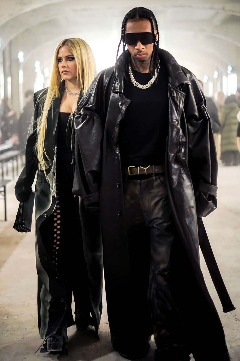 Paris Fashion Week: Avril Lavigne and Tyga Channel the ‘Matrix’ in Black, More