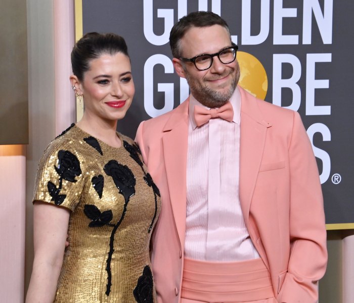 Seth Rogen Opened Up About How Not Having Kids With Wife Lauren Miller ‘Helps Him Succeed’ in His Career pink suit