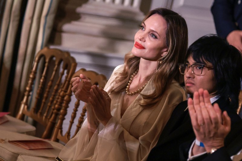 A Welcome Reception Angelina Jolie and Son Maddox Make Rare Joint Appearance at White House State Dinner