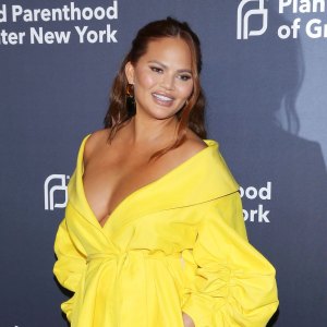 Chrissy Teigen Assures Critics That Her Daughter Is ‘Safe’ After Getting Called Out for Not Using Baby Carrier 'Right' Promo: Chrissy Teigen Responds to Critic