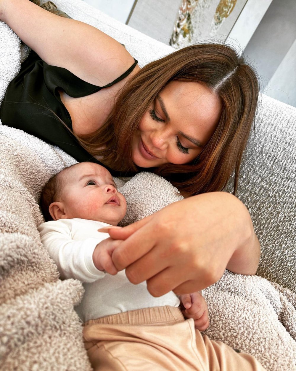 Chrissy Teigen Embraces Lifetime Scars and Body Imperfections While Sitting Nude in the Bath With Daughter Esti