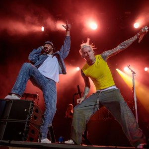Travis Kelce Joins Machine Gun Kelly on Stage During 'Kelce Jam': See Photos From Their Duet