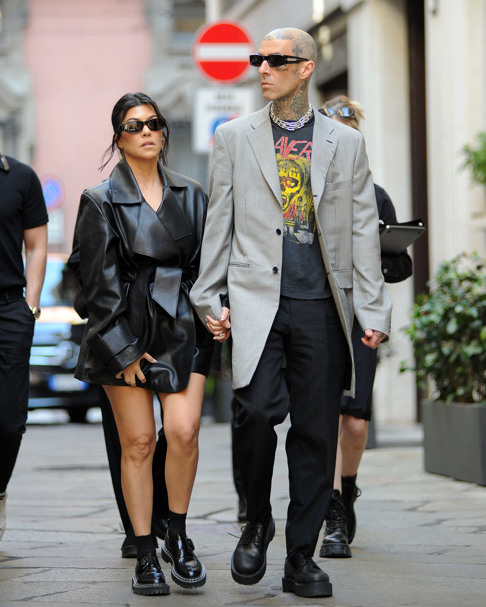 Travis Barker and Kourtney Kardashian Break Down Behind-the-Scenes Details From Their Italian Nuptials: Helicopter Drops, Wedding Day Boat Jumps and More