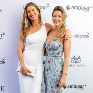 Feature Gisele Bundchen Poses With Twin Sister Patricia in Rare Red Carpet Appearance