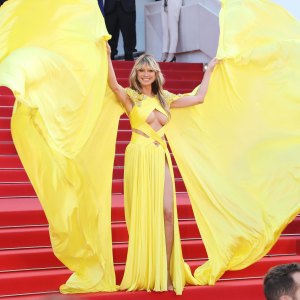 Heidi Klum Suffers Nip Slip at Cannes at the 2023 Film Festival in Busy Yellow Gown: Photos
