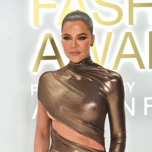 Khloe Kardashian Wears Kim Kardashian Meme Shirt While Holding Son