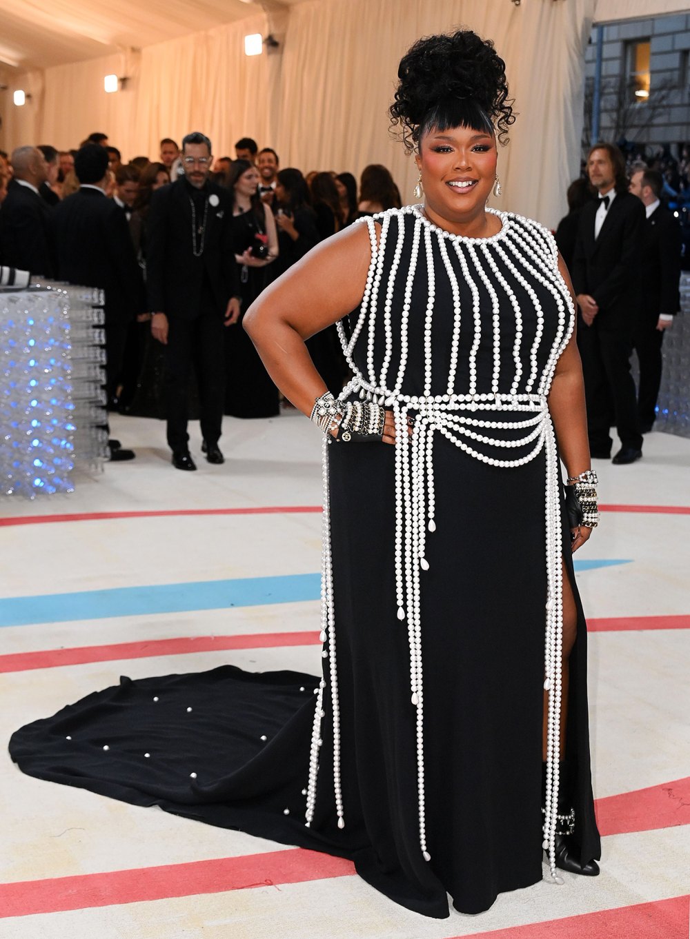 Lizzo Brings the Drama With a Fabulous Pearl-Covered Gown at the 2023 Met Gala- Photos 694