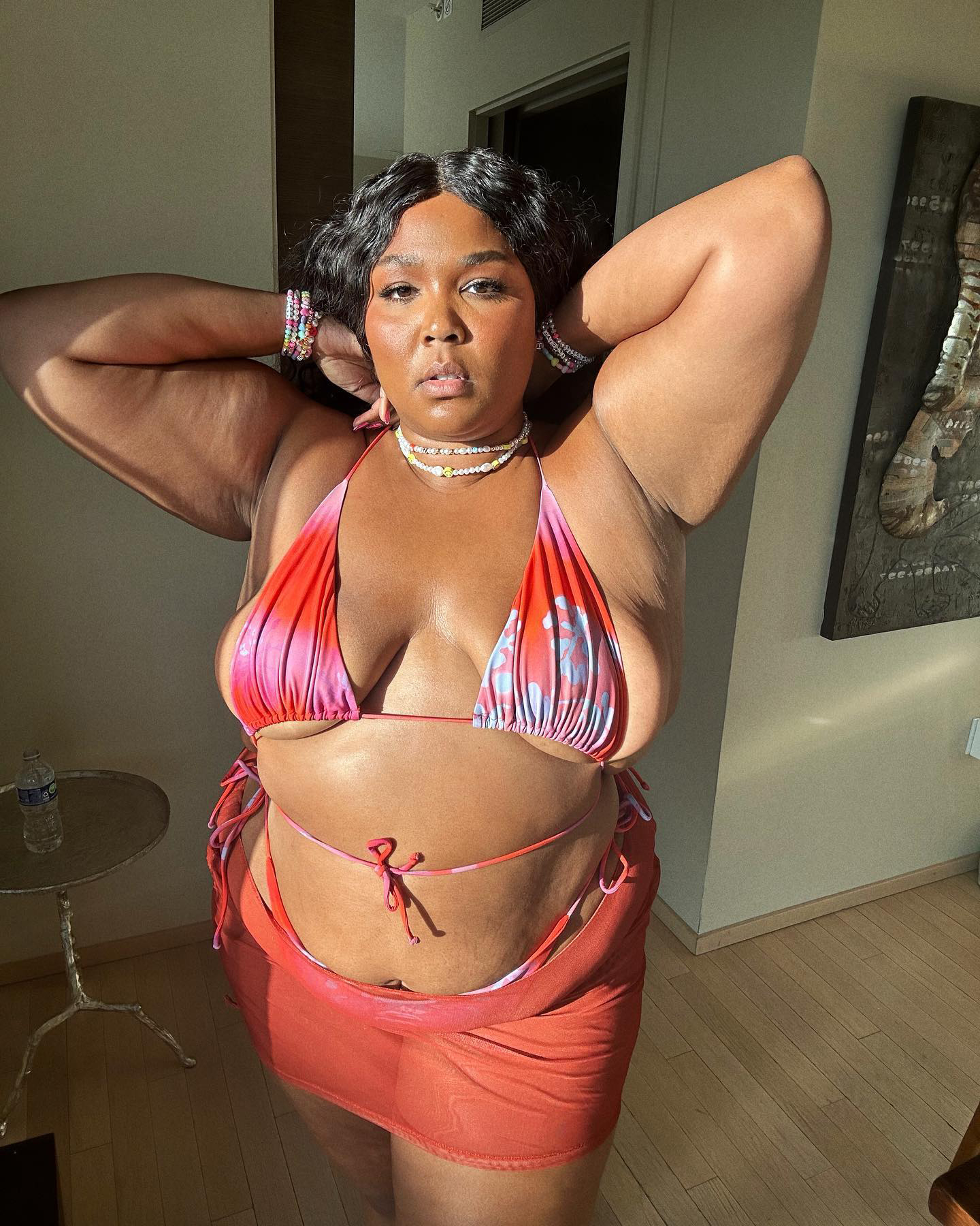 Lizzo Is Ready for Bikini Season, Stuns in Pink Swimsuit Photo picture