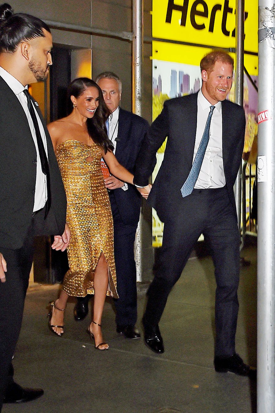 Making a Statement Meghan Markle Stuns in a Golden Gown at the 2023 Women of Vision Awards With Husband Prince Harry and Mom Doria Ragland 2