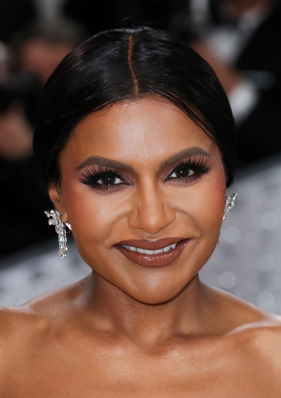 Mindy Kaling Shows Off Slim Figure in Shimmering Corset Gown on 2023 Met Gala Red Carpet 632
