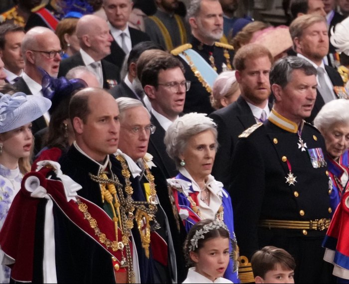 Prince Harry watches Prince William from the third row of the Coronation Service