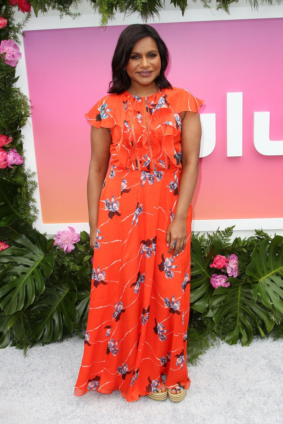 See Mindy Kaling’s Sultry Fashion Evolution: From Corset Dresses to Sparkly Gowns: Photos