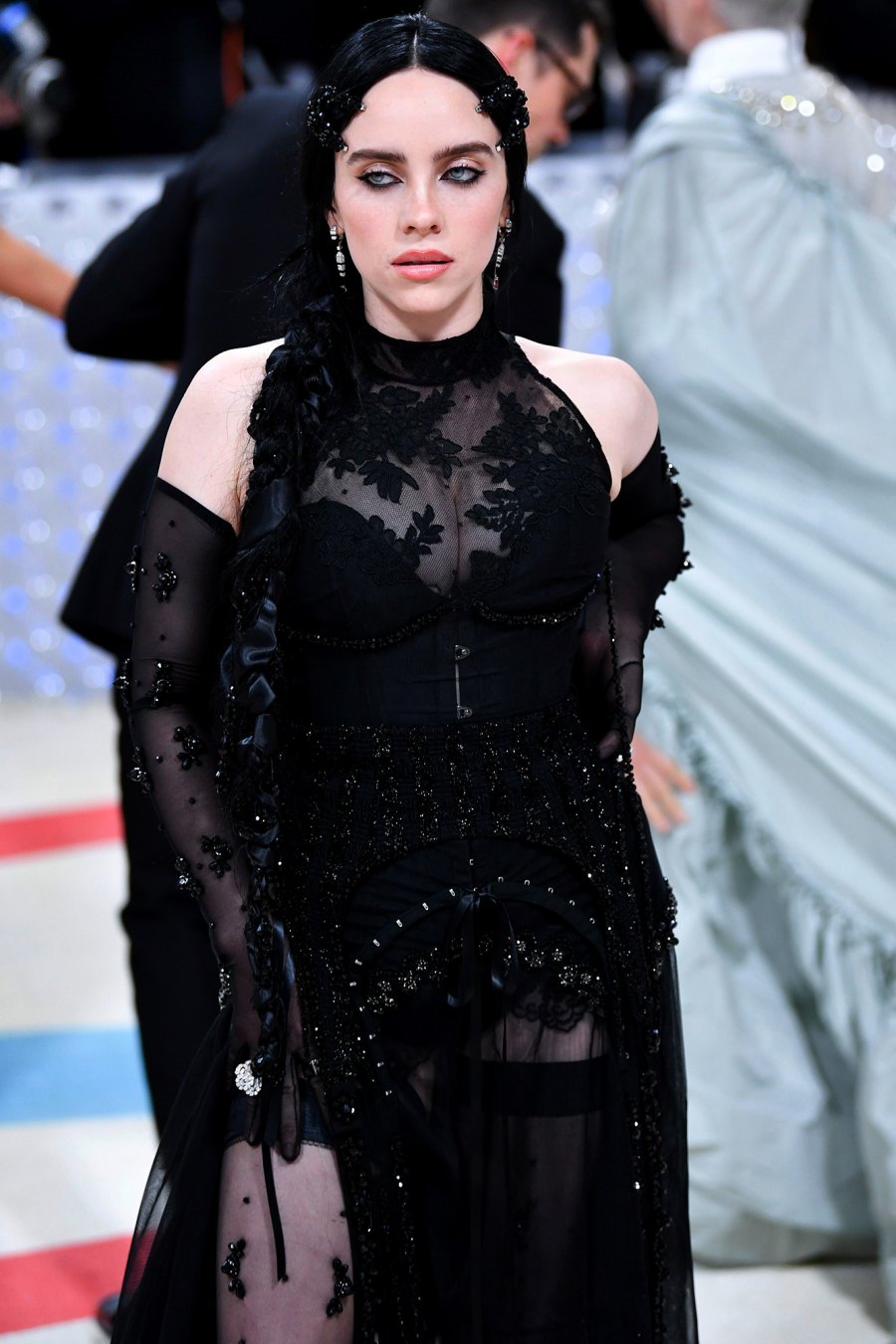 Billie Eilish Stuns at the 2023 Met Gala Red Carpet in a Sheer Black Gown: Photos