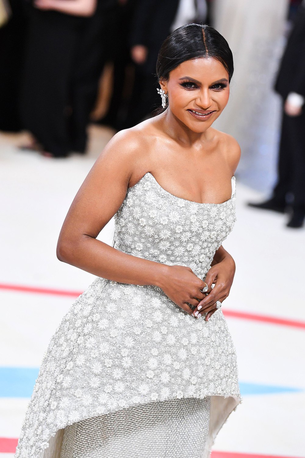 Mindy Kaling Shows Off Slim Figure in Shimmering Corset Gown on 2023 Met Gala Red Carpet