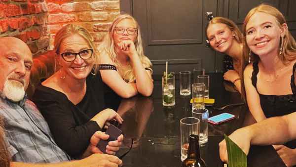Christine Brown Travels to London With Fiancee David Woolley, Daughters