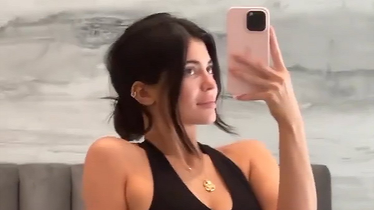 Kylie Jenner shows off her sculpted abs in chic black sports bra