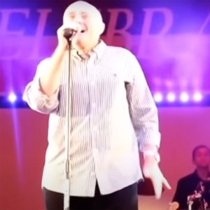 Phil Collins Comes Out of Retirement, Performs "In the Air Tonight" At Sons' Middle School