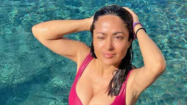 Salma Hayek Wears Plunging One-Piece Swimsuit