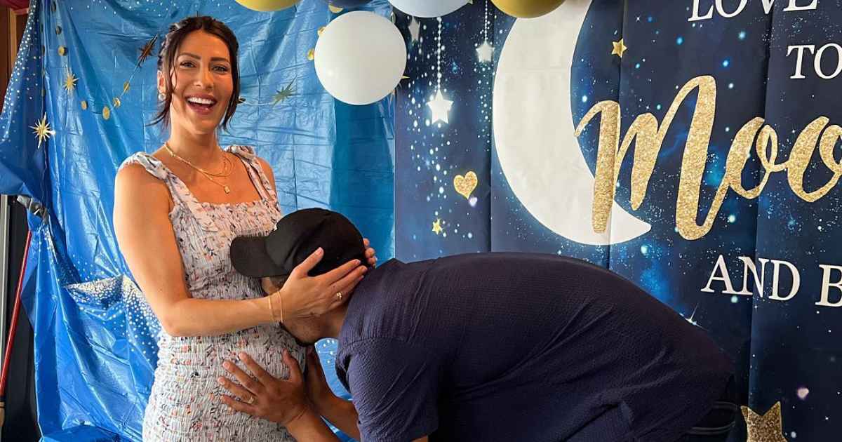 becca kufrin blue dress Becca Kufrin and Thomas Jacobs Already Love Their Son to the Moon and Back at Hometown Baby Shower