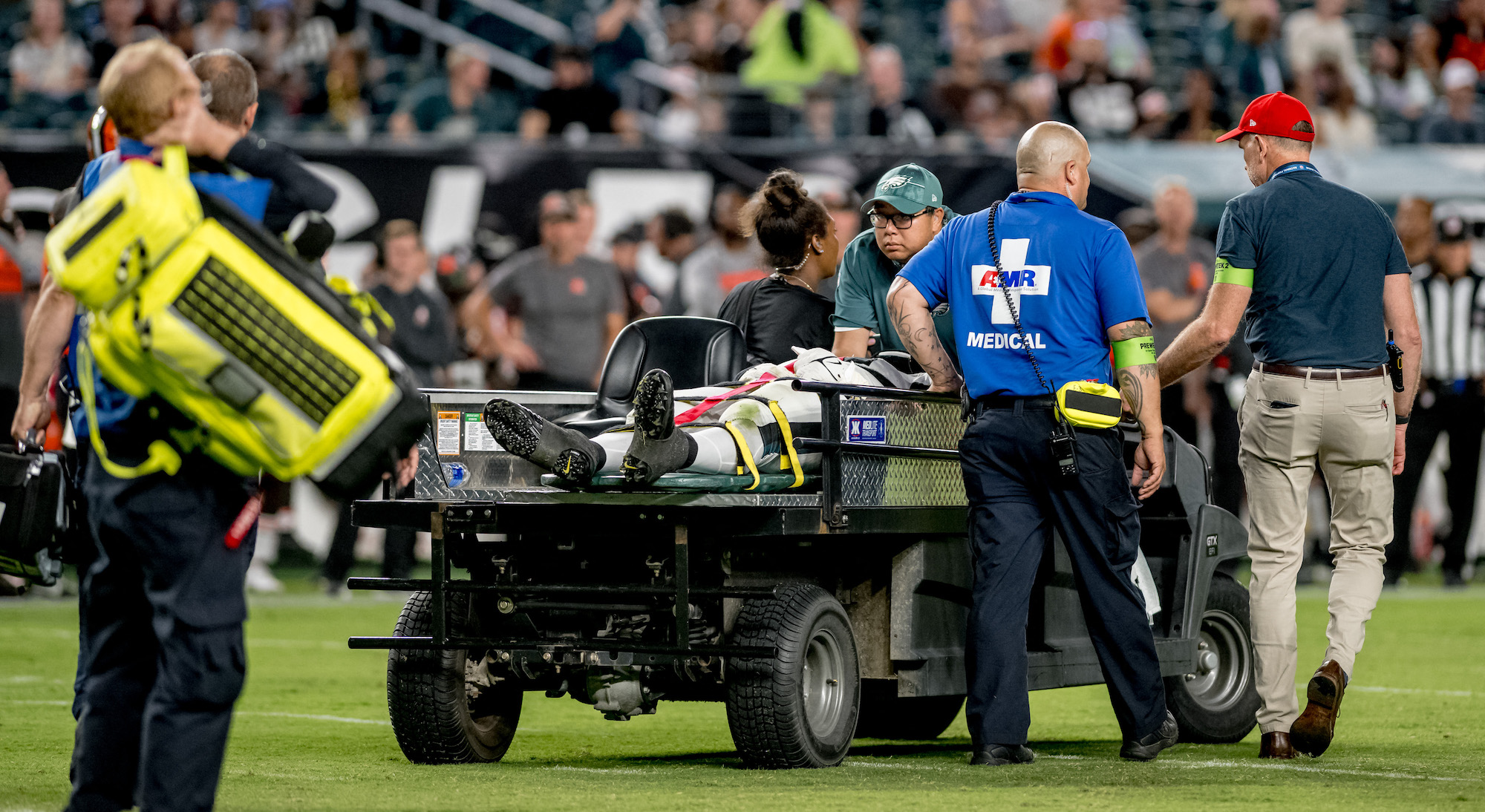 Two Eagles players stretchered off field after neck injuries during game