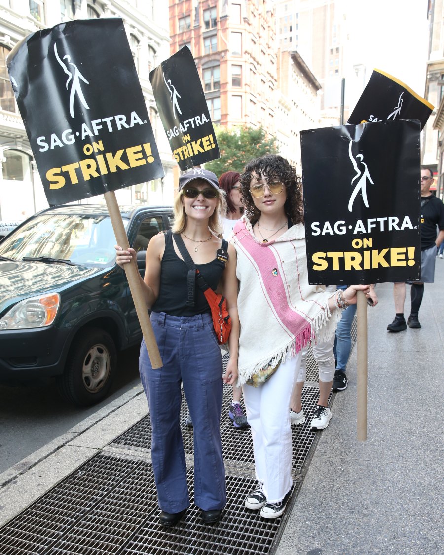 AnnaSophia Robb and Stefania LaVie Owen walk the picket line for SAG-AFTRA outside Warner Brothers in New York City