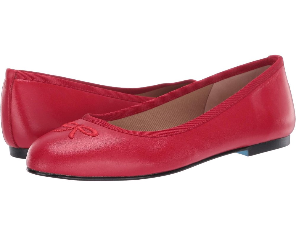 For fall, we're betting big on fiery-red pieces, flat shoes