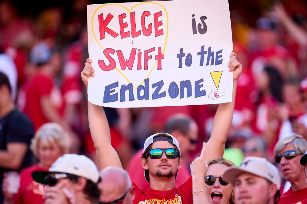 A fan holds a "Kelce is Swift to the Endzone" sign at the Chiefs game on September 24, 2023.