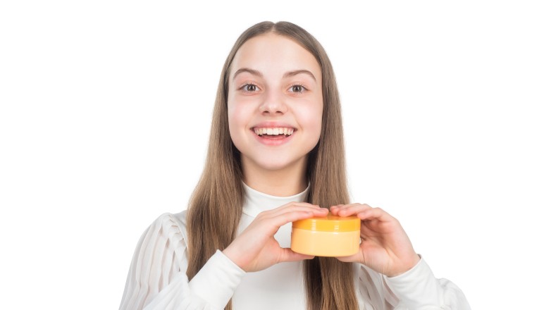 Girl using the best keratin hair mask